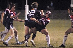 Mackay High's Jorden White is tackled by St Patrick's Matt McCurry. Tony Martin