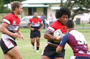 Mate Ryan and Dennis Tomarchio of Kirwan take on Brydon Sutton and Ryan Ridland of Mackay State High School during their Super 8 trial yesterday. Lee Constable