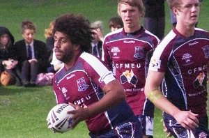 Damon Mooney runs the footy against Outwood Grange College in game 1 